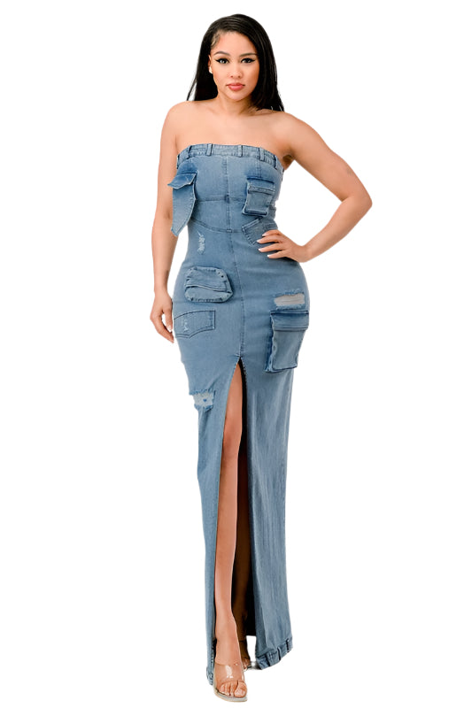 Where edgy streetwear meets evening elegance. This unique piece combines the casual appeal of denim with the sophistication of a formal gown. The garment boasts a strapless bodice with a straight-across neckline, highlighted by a playful ruffle that adds a touch of feminine flair.