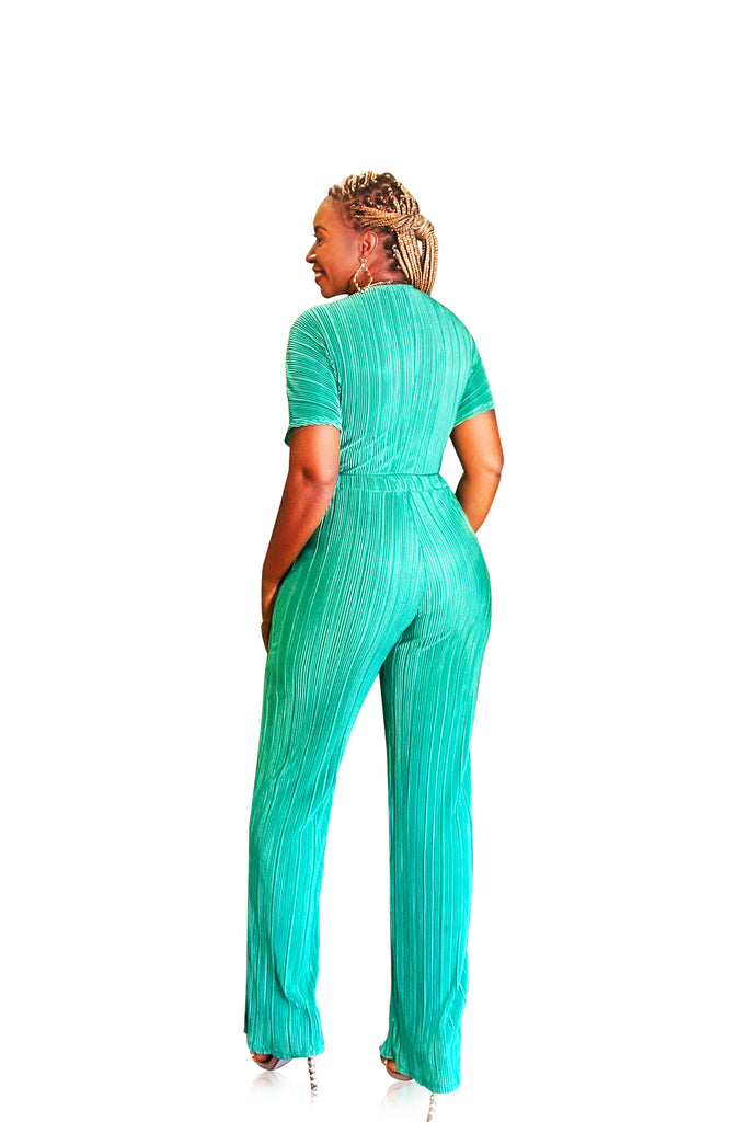 Emerald green two-piece set with short sleeve crop top and self-tie front, paired with high-waisted wide-leg pants featuring an elastic waistband. Stylish with great stretch and comfort.