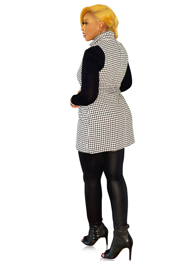 Black and white houndstooth sleeveless jacket with front pockets and self-tie belt