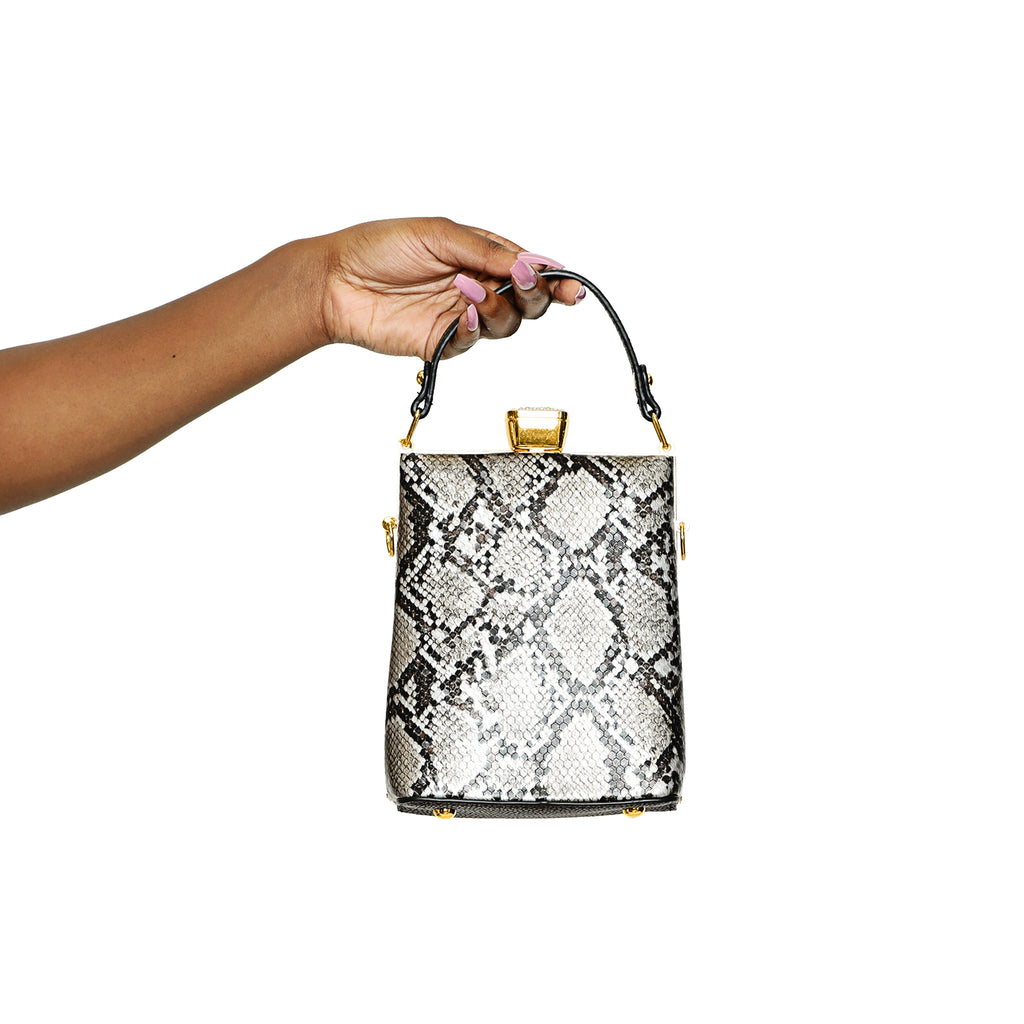About the Business - Oval Handbag-Snake Skin - Luxe Clothing Boutique & Accessories