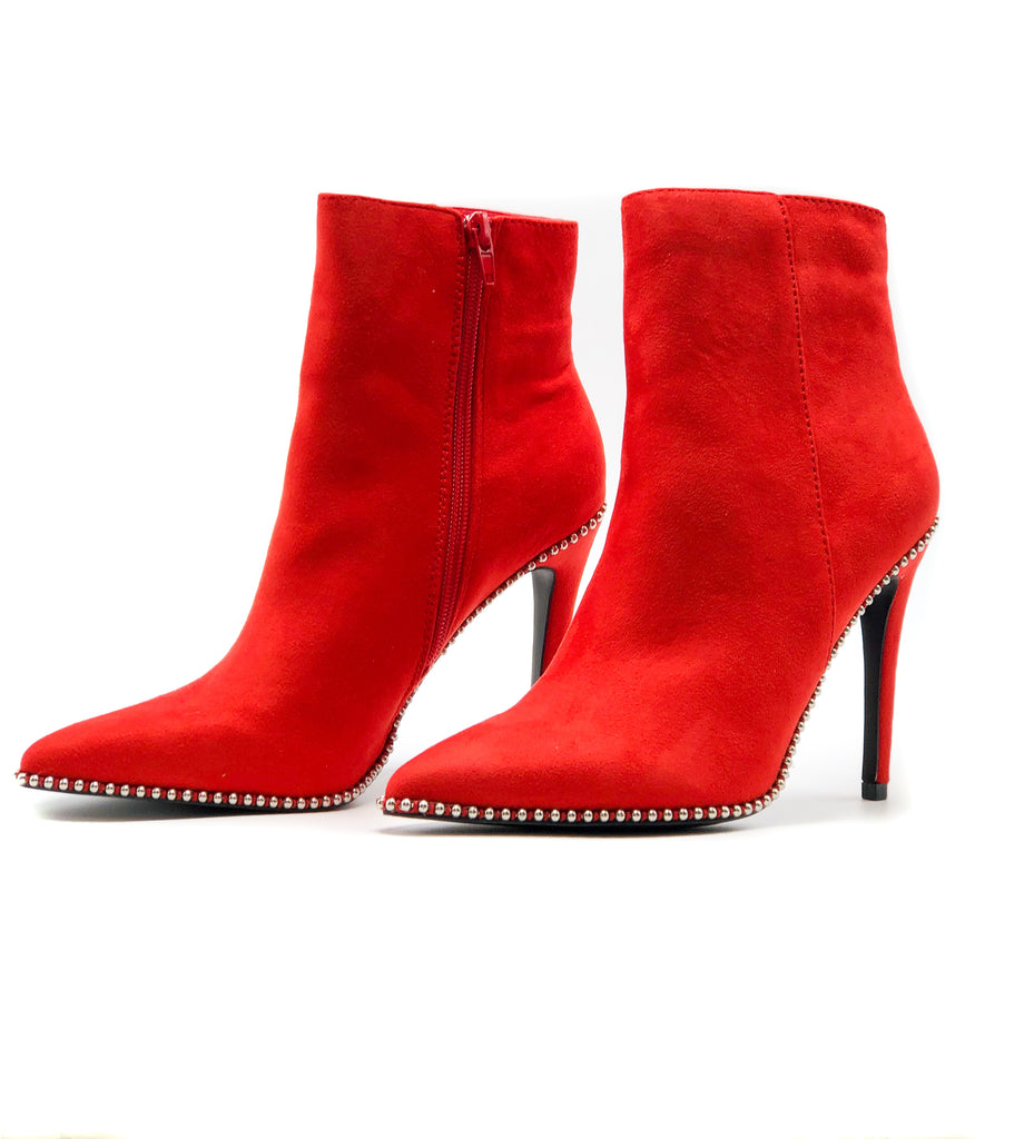 Super chic, bright red booties, faux suede material with a point toe design with stylishly adorned silver