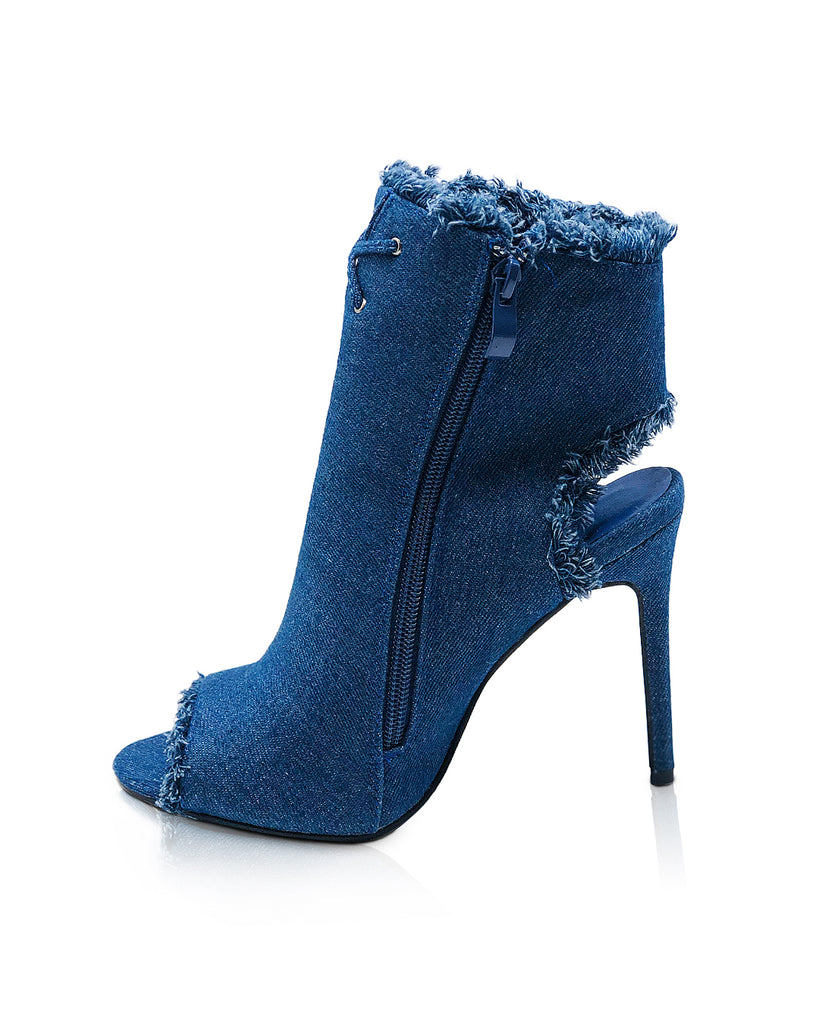 Medium denim wash open toe bootie is just the style your closet needs.