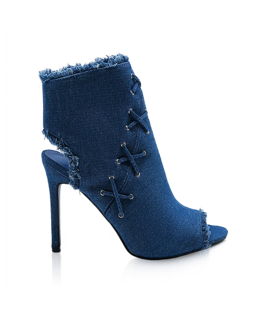 Medium denim wash open toe bootie is just the style your closet needs.
