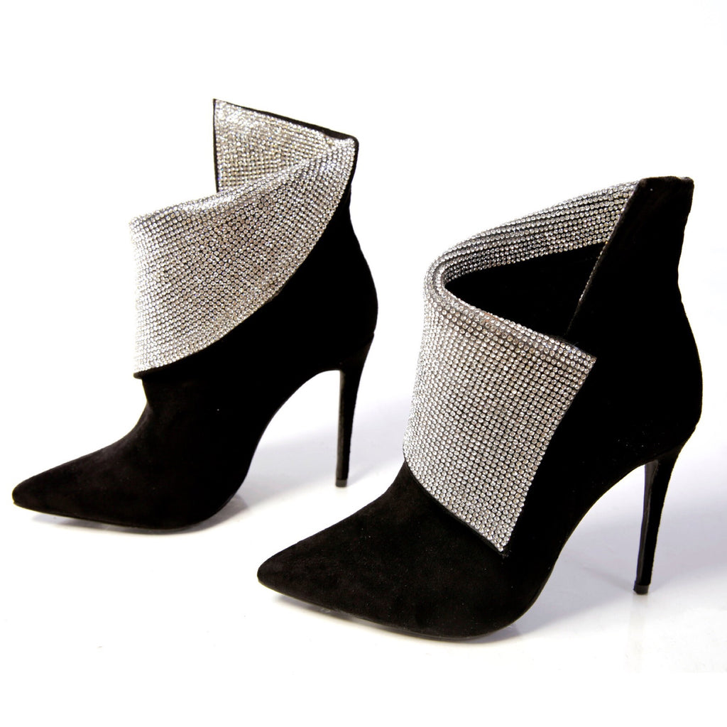 Black suede ankle booties with fold over bling details.